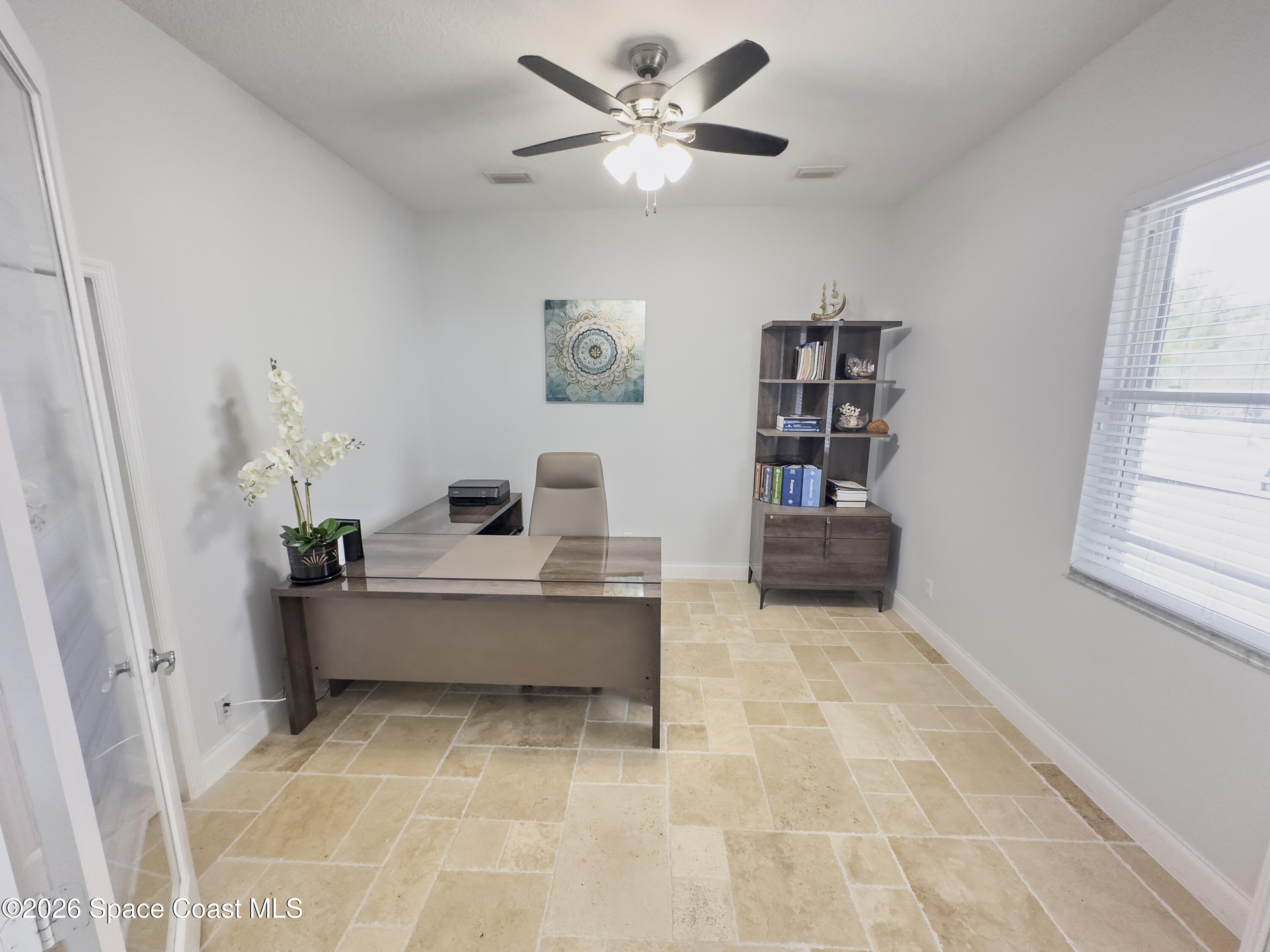 4762 Blossom Ridge Place Grant, FL 32949 - Photo 21 of 42 a living room with furniture and window