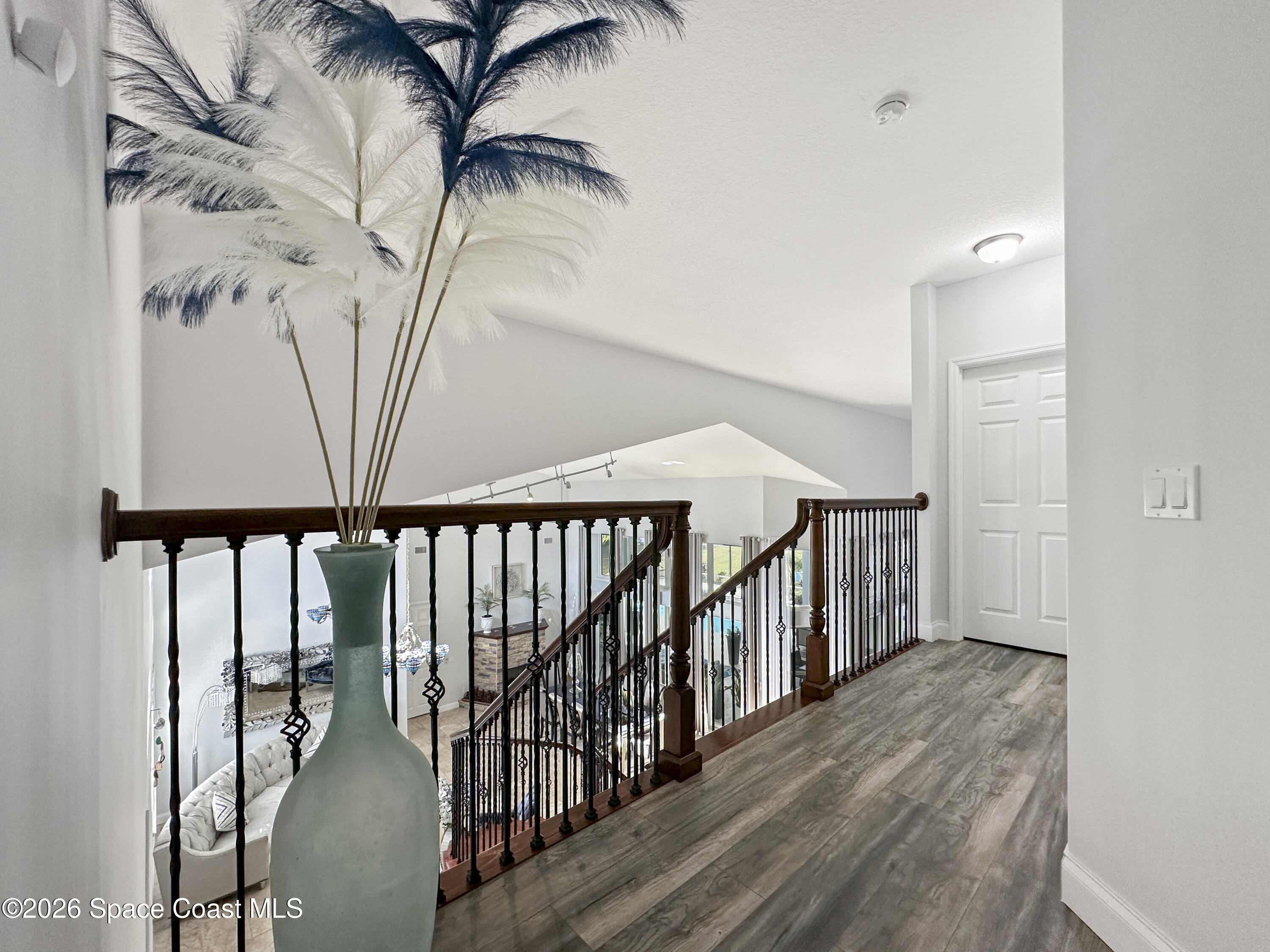 4762 Blossom Ridge Place Grant, FL 32949 - Photo 24 of 42 a view of entryway with wooden floor