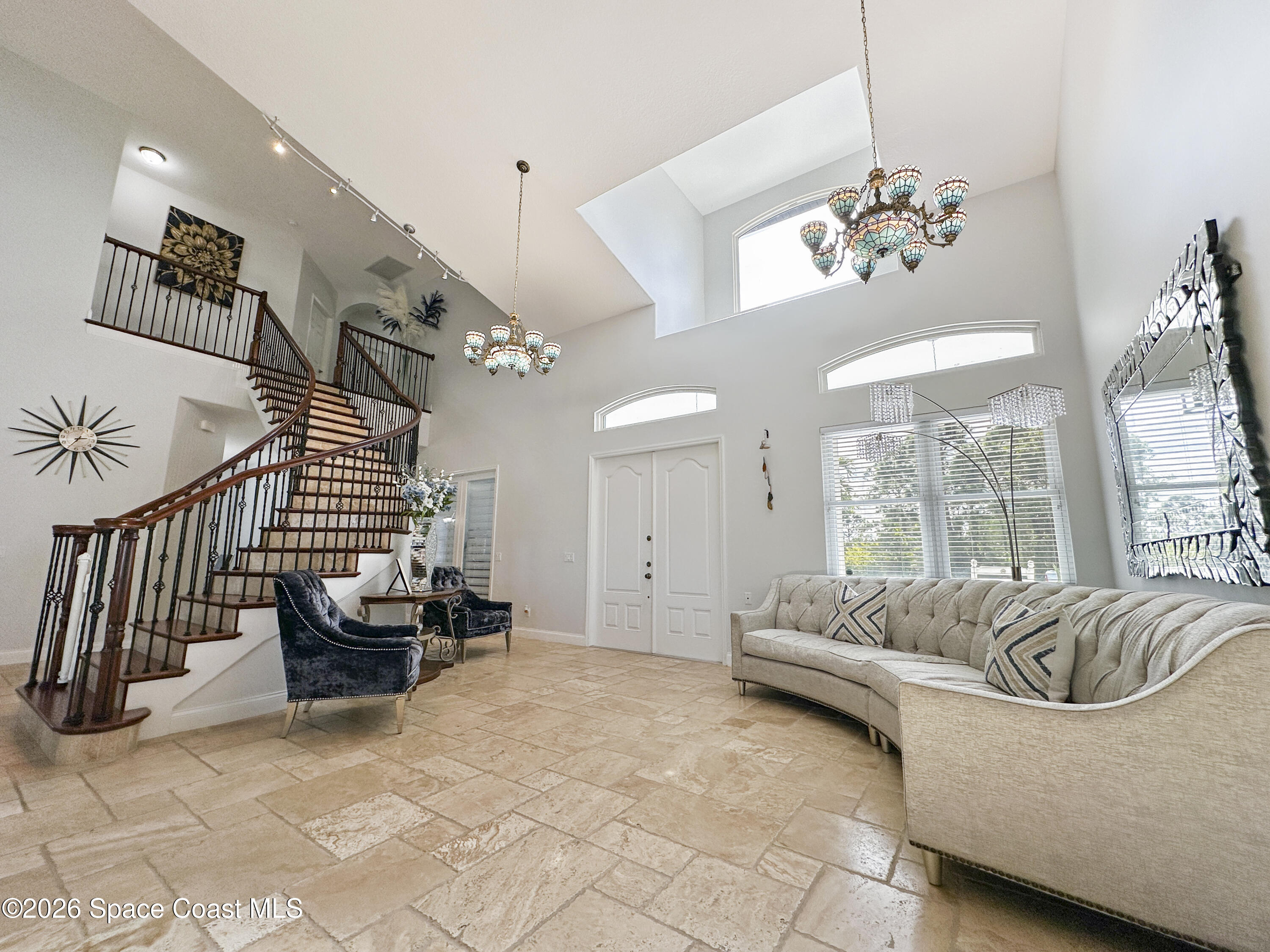 4762 Blossom Ridge Place Grant, FL 32949 - Photo 5 of 42 a living room with furniture and a large window
