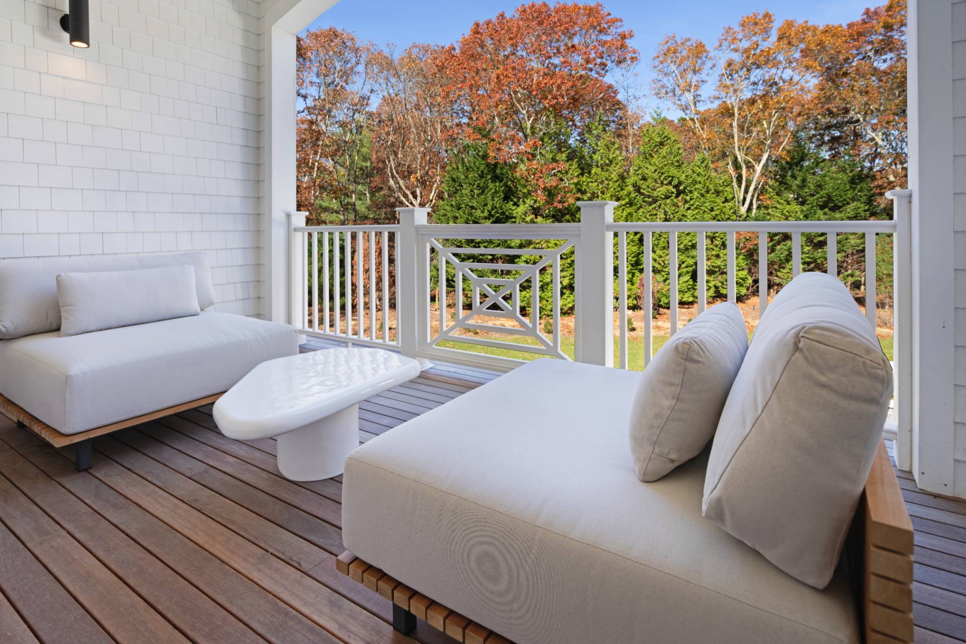73 Wainscott Stone Road Wainscott, NY 11975 - Photo 22 of 27 a balcony with furniture and a potted plant