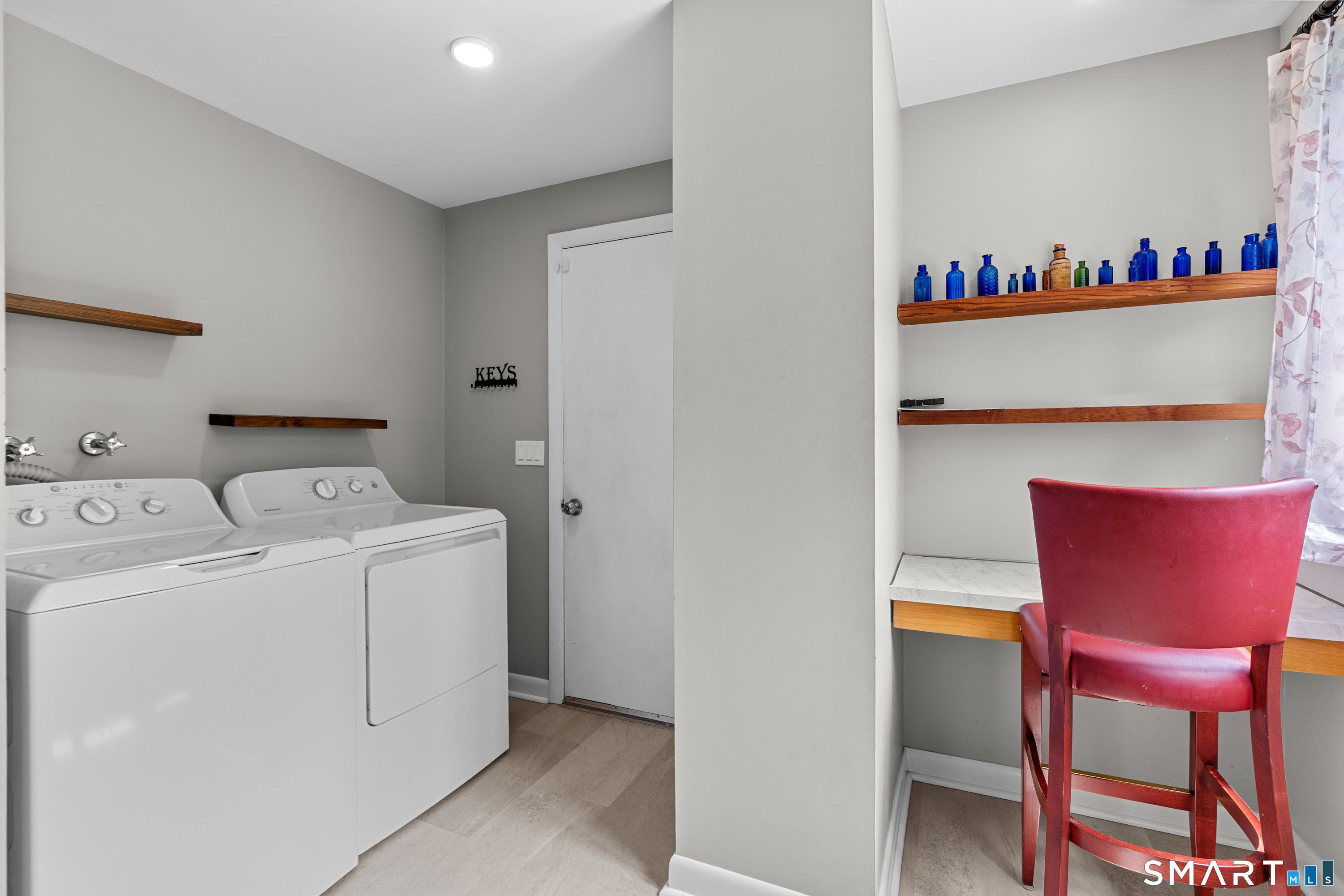 107 Round Hill Road Wethersfield, CT 06109 - Photo 15 of 40 a utility room with dryer and washer