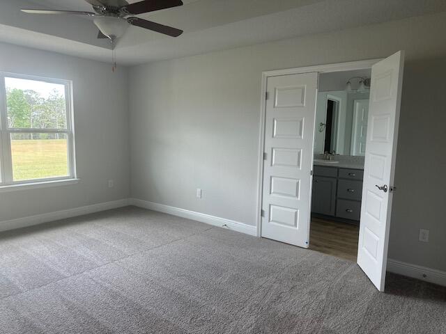 6118 Buckshot Drive Crestview, FL 32539 - Photo 16 of 22 an empty room with a window and a ceiling fan