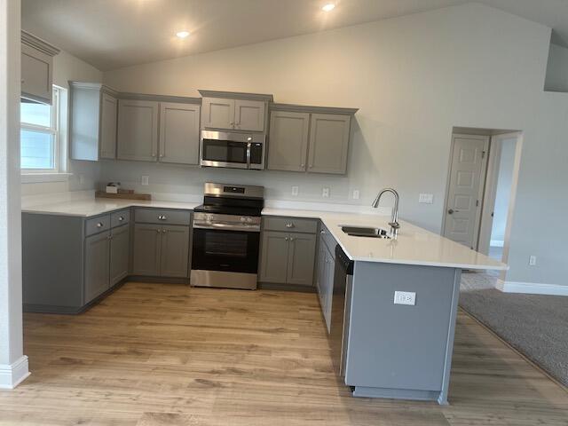 6118 Buckshot Drive Crestview, FL 32539 - Photo 19 of 22 a kitchen with stainless steel appliances granite countertop a sink a stove top oven a counter space and cabinets
