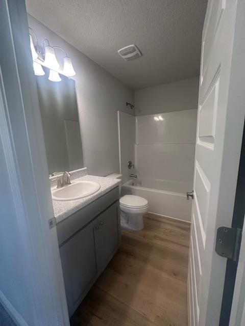 6118 Buckshot Drive Crestview, FL 32539 - Photo 9 of 22 a bathroom with a toilet sink and mirror