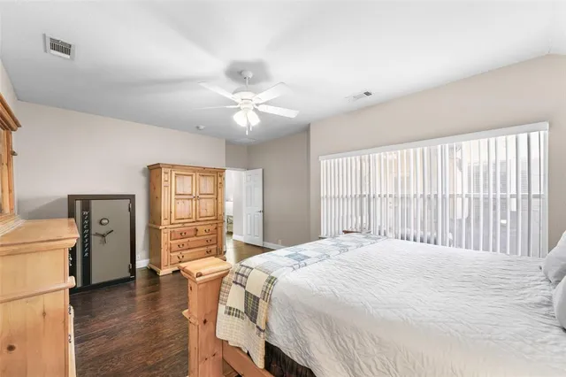 a bathroom with a sink a large mirror and a bathtub with shower