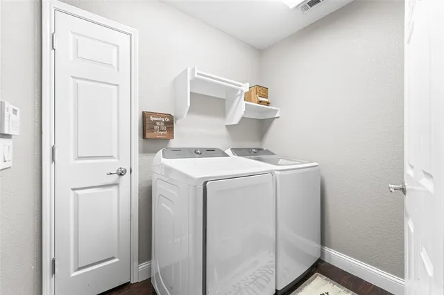 a view of a backyard of the house