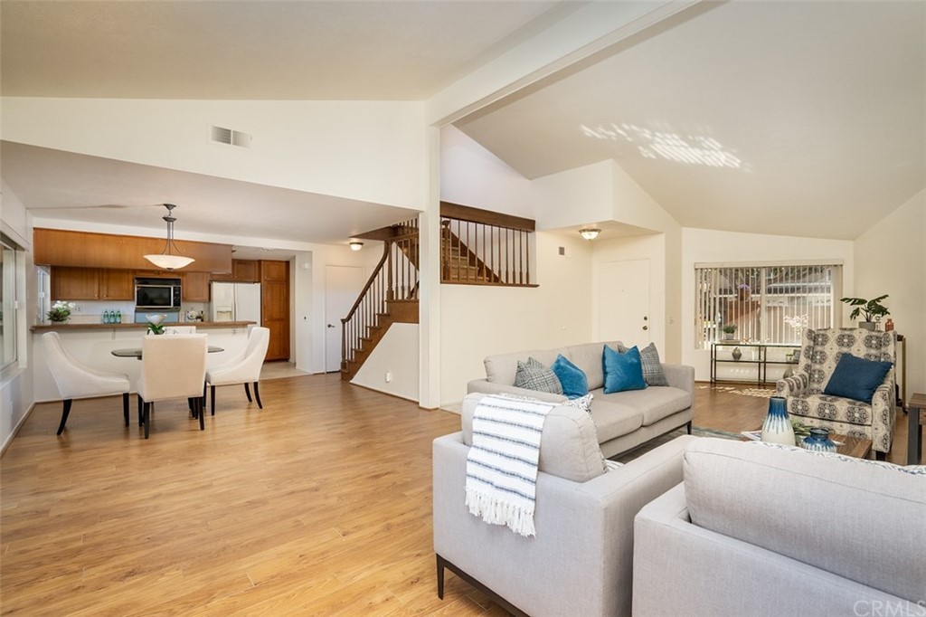 7951 Waterfall Circle Huntington Beach, CA 92648 - Photo 12 of 40 a living room with furniture and wooden floor
