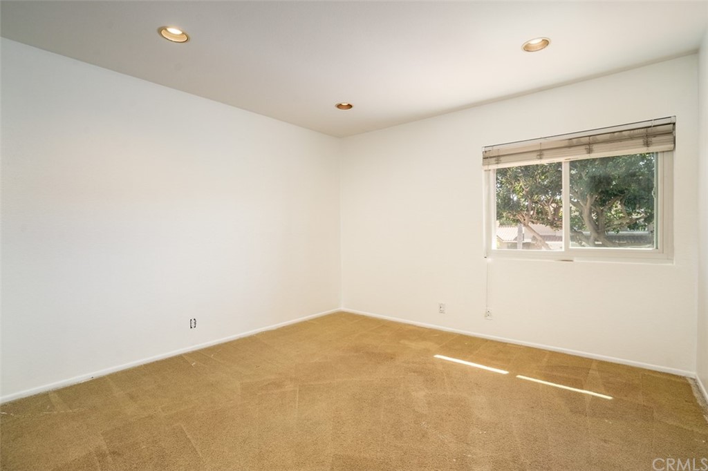 7951 Waterfall Circle Huntington Beach, CA 92648 - Photo 22 of 40 an empty room with a window