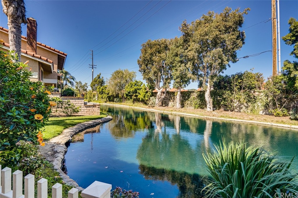 7951 Waterfall Circle Huntington Beach, CA 92648 - Photo 28 of 40 a view of a lake with a house