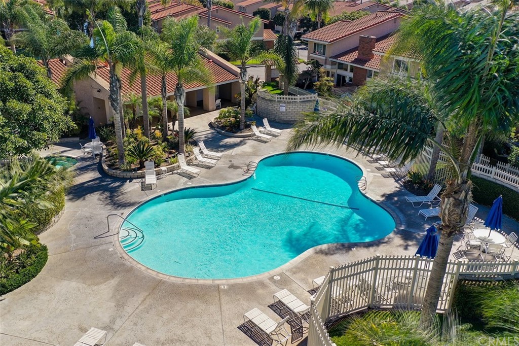 7951 Waterfall Circle Huntington Beach, CA 92648 - Photo 38 of 40 an aerial view of a house with swimming pool and garden