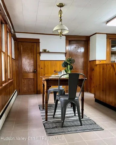 a view of a dining room with furniture