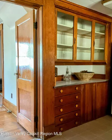 a kitchen with a stove and a refrigerator