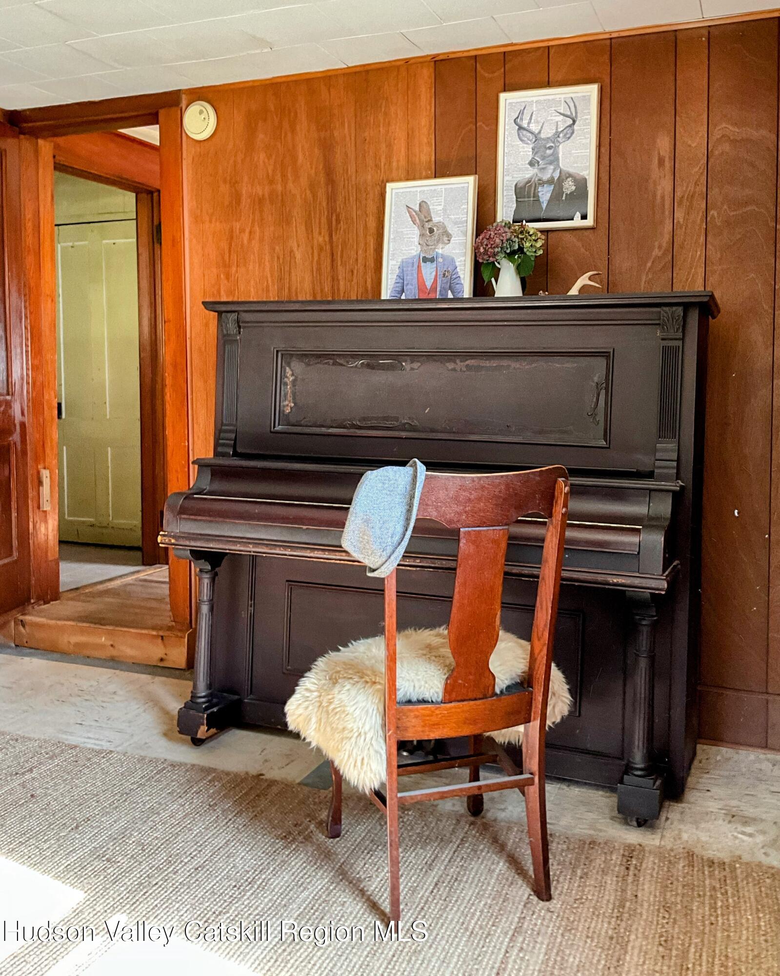 729 Springtown Road Tillson, NY 12486 - Photo 37 of 52 a living room with furniture and a lamp