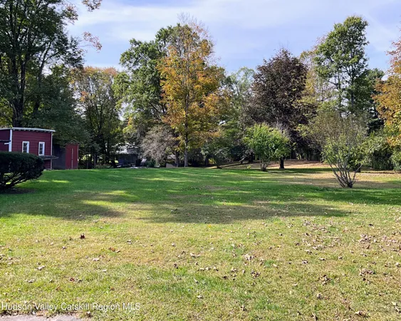a view of a swimming pool with an outdoor space