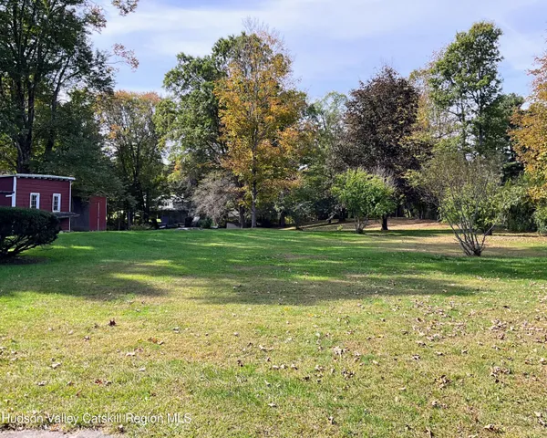 a view of a swimming pool with an outdoor space