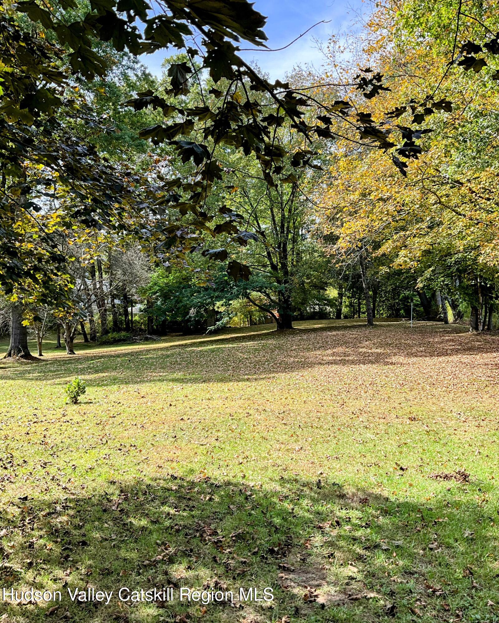 729 Springtown Road Tillson, NY 12486 - Photo 44 of 52 a view of a swimming pool with an outdoor space