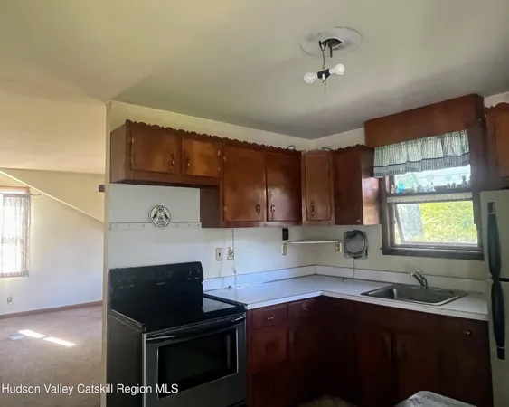 view of an empty room with a window