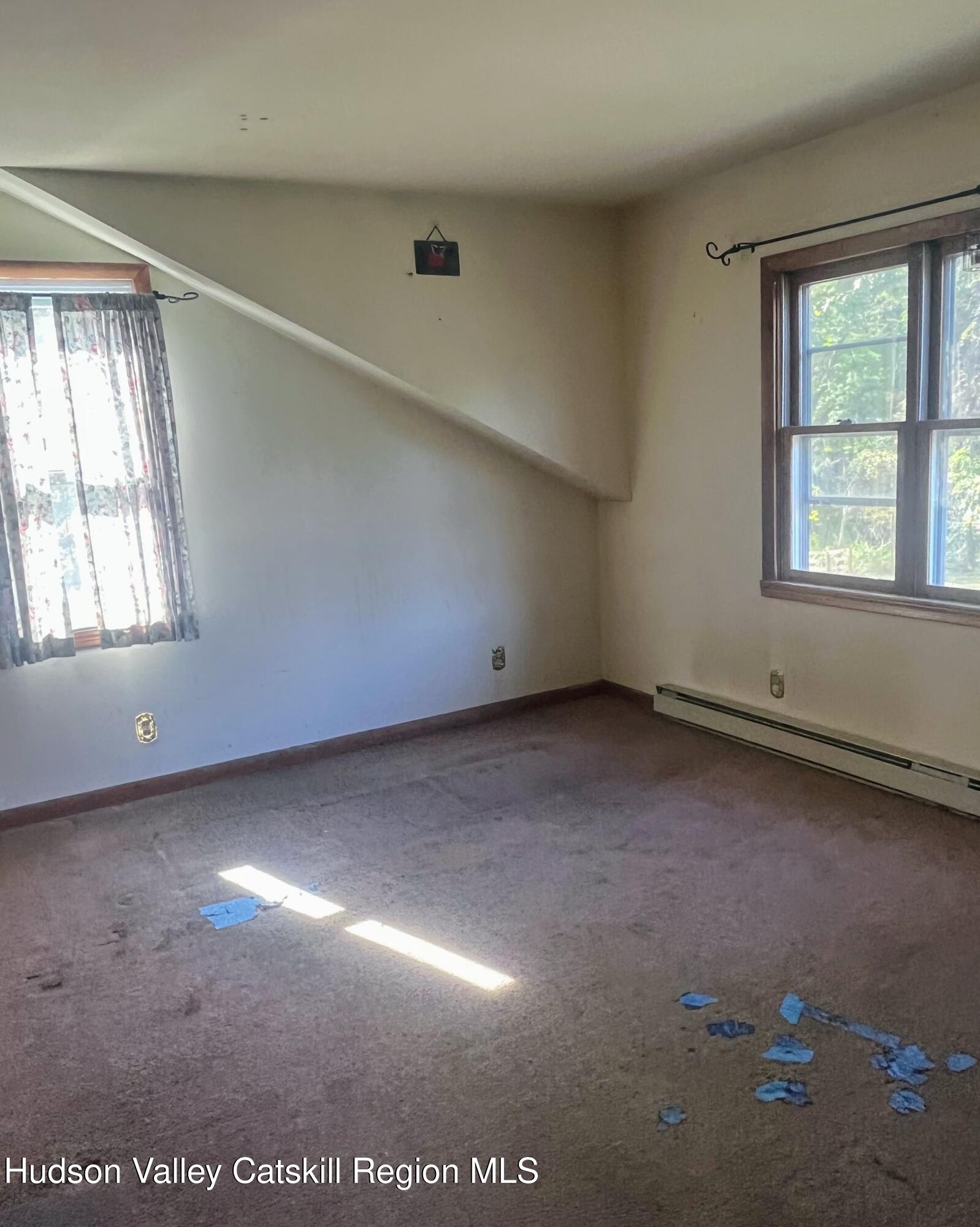 729 Springtown Road Tillson, NY 12486 - Photo 50 of 52 an empty room with windows