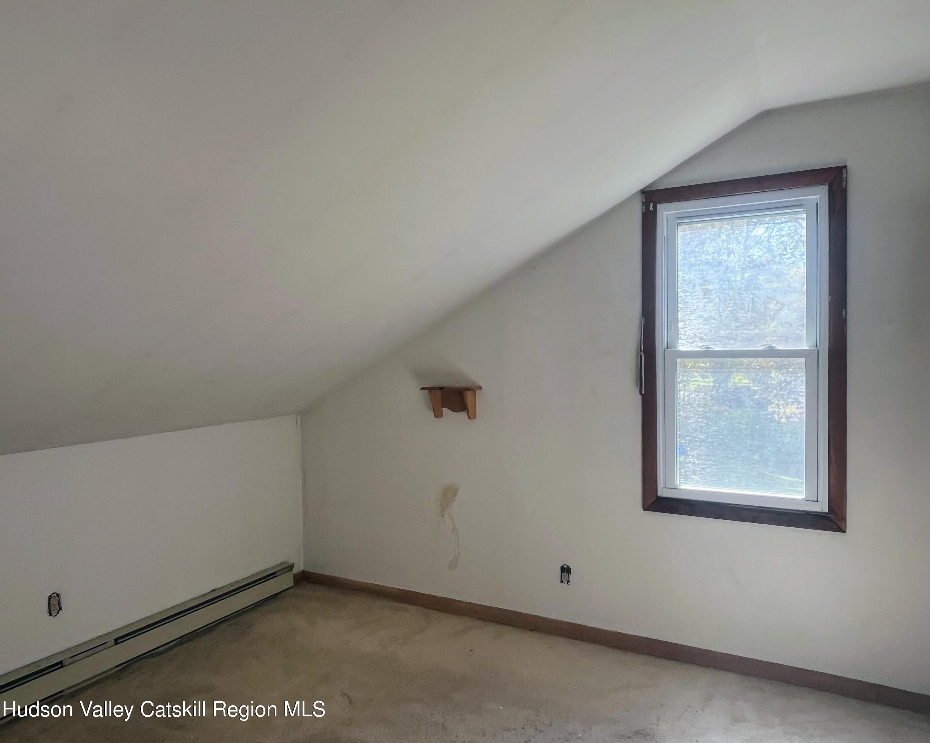 729 Springtown Road Tillson, NY 12486 - Photo 52 of 52 an empty room with windows