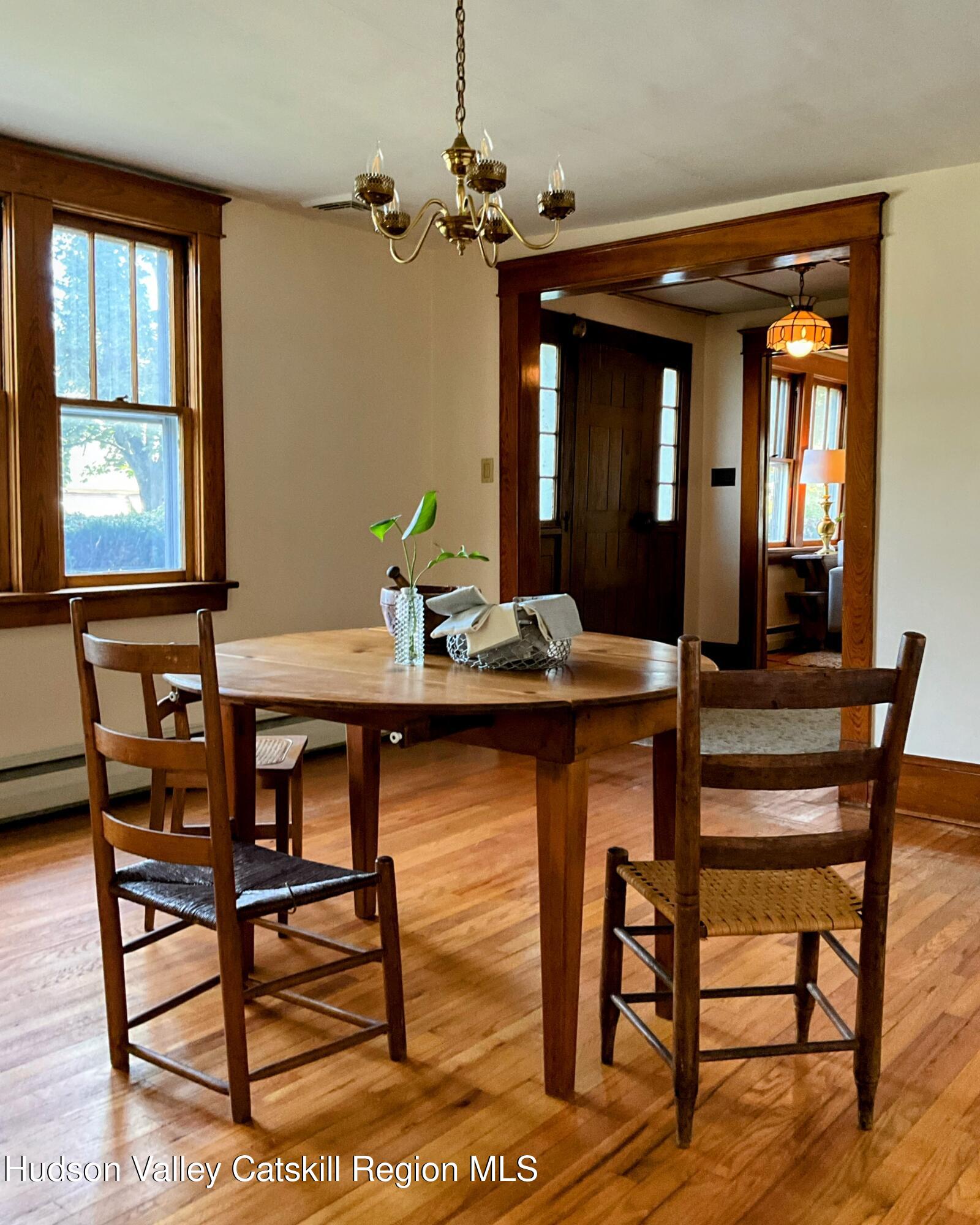 729 Springtown Road Tillson, NY 12486 - Photo 9 of 52 a view of a dining room with furniture and window