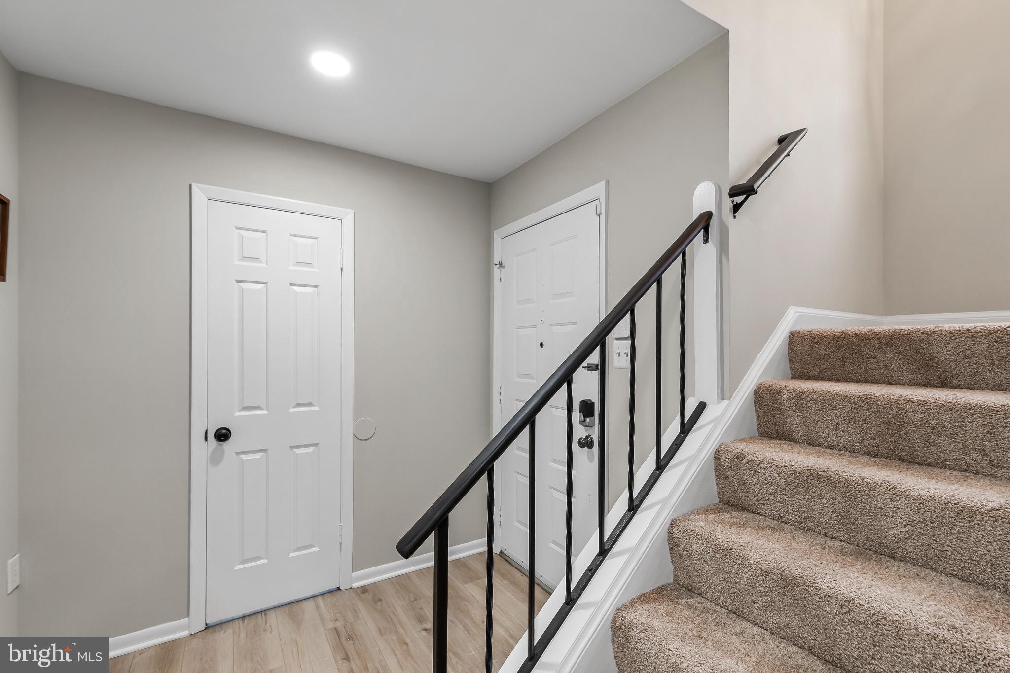 11867 Old Columbia Pike, Unit 75 Silver Spring, MD 20904 - Photo 15 of 41 a view of staircase with wooden floor and stairs