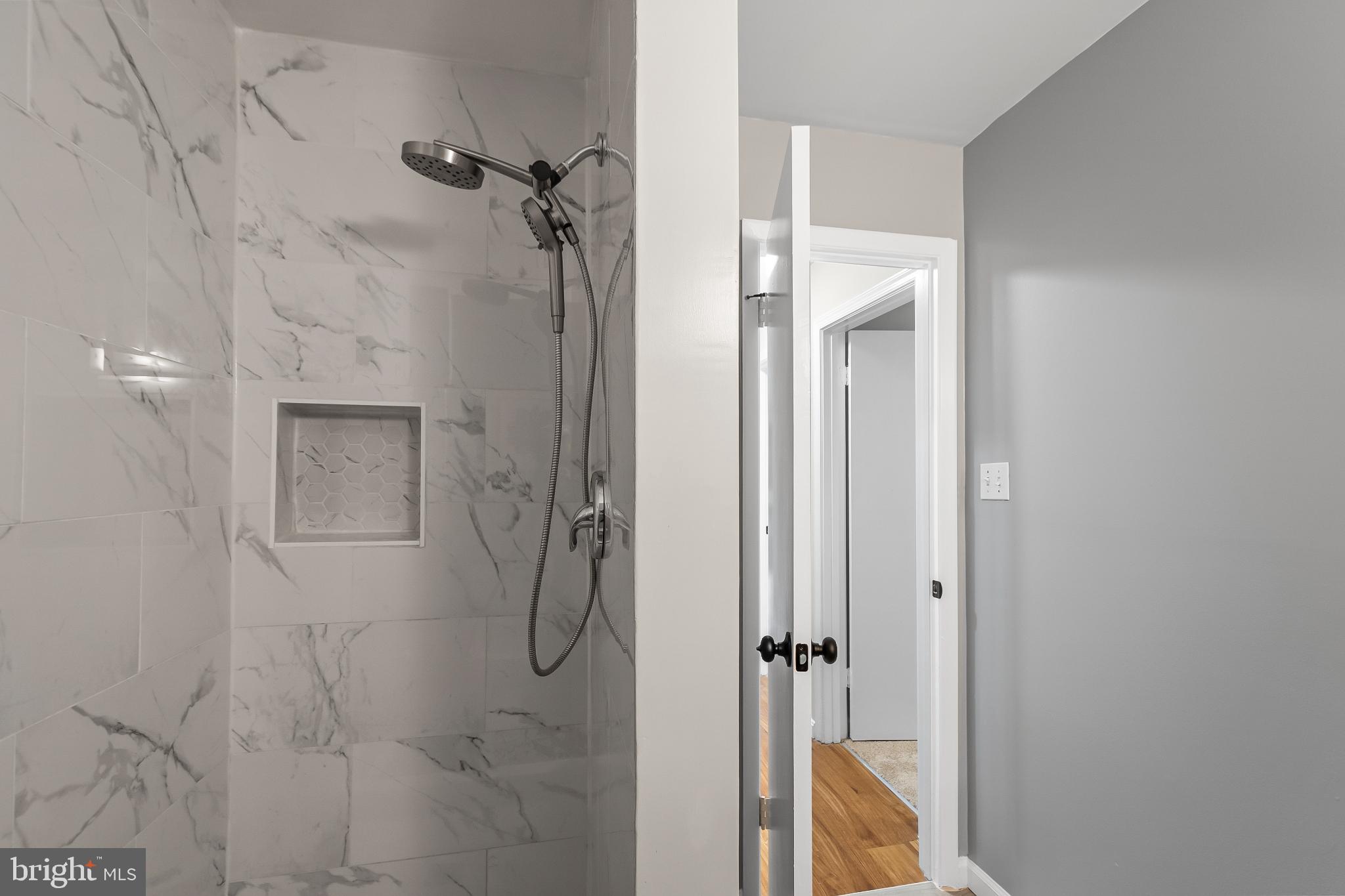 11867 Old Columbia Pike, Unit 75 Silver Spring, MD 20904 - Photo 28 of 41 a bathroom with a shower