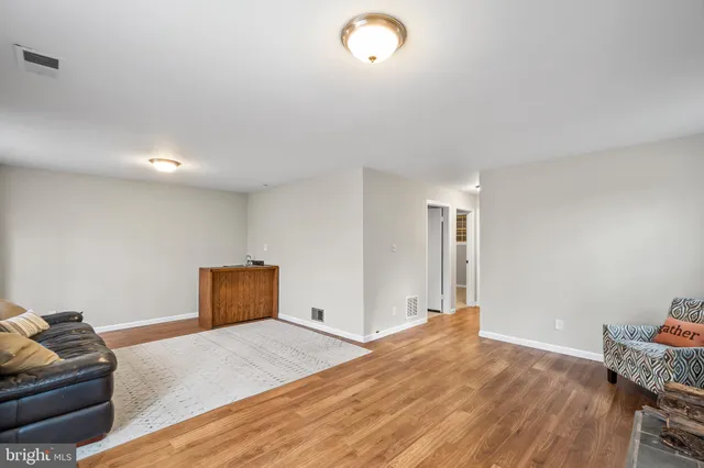 a bedroom with bed and window