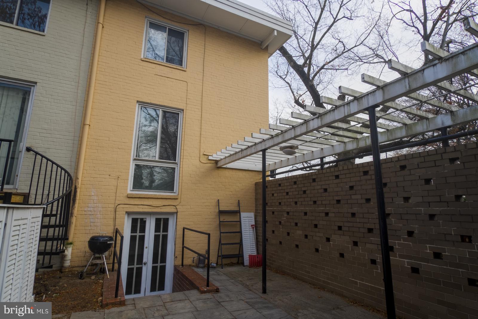 301 I Street Southwest, Unit 108 Washington, DC 20024 - Photo 19 of 66 a view of a house with a door and wooden walls