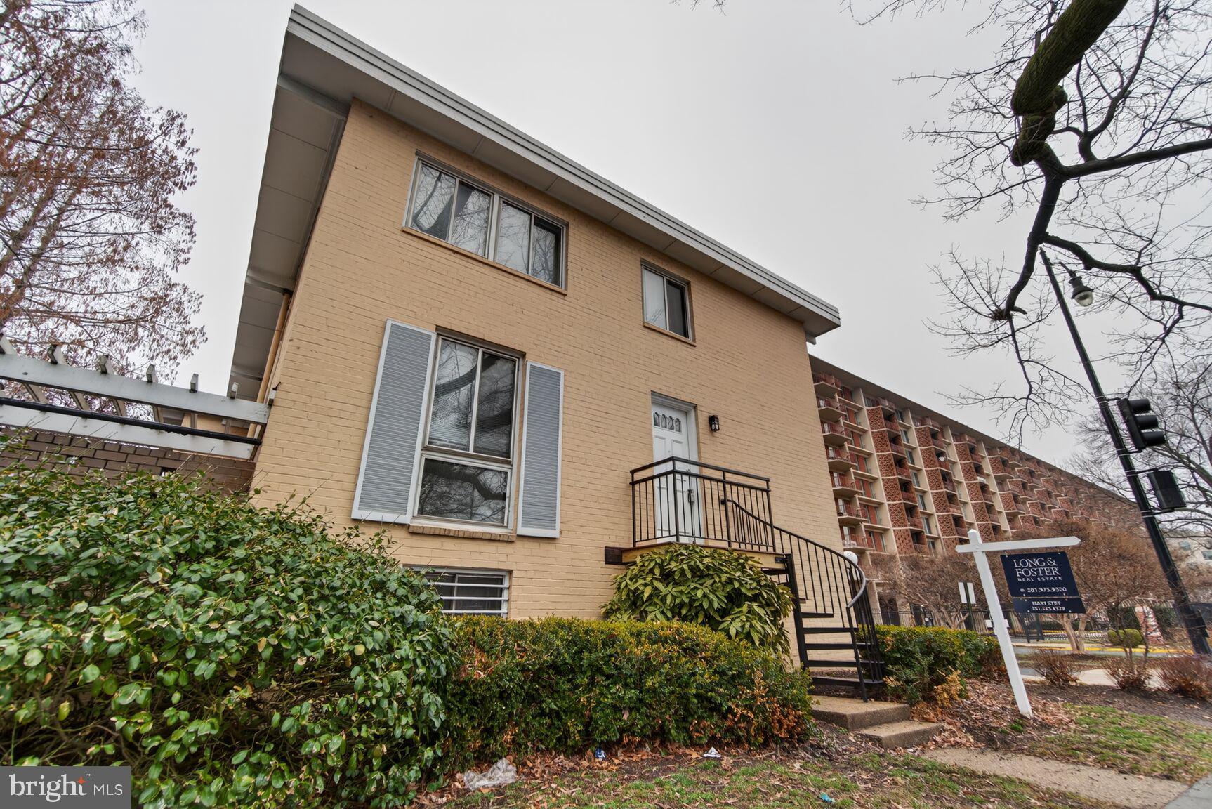 301 I Street Southwest, Unit 108 Washington, DC 20024 - Photo 47 of 66 a view of a house with a tree