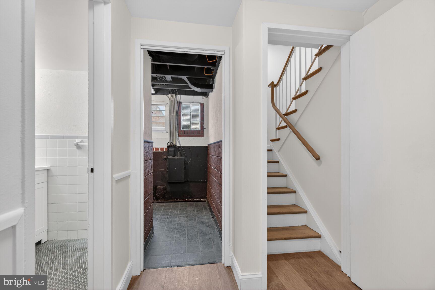 301 I Street Southwest, Unit 108 Washington, DC 20024 - Photo 48 of 66 a view of a hallway with wooden floor and entryway