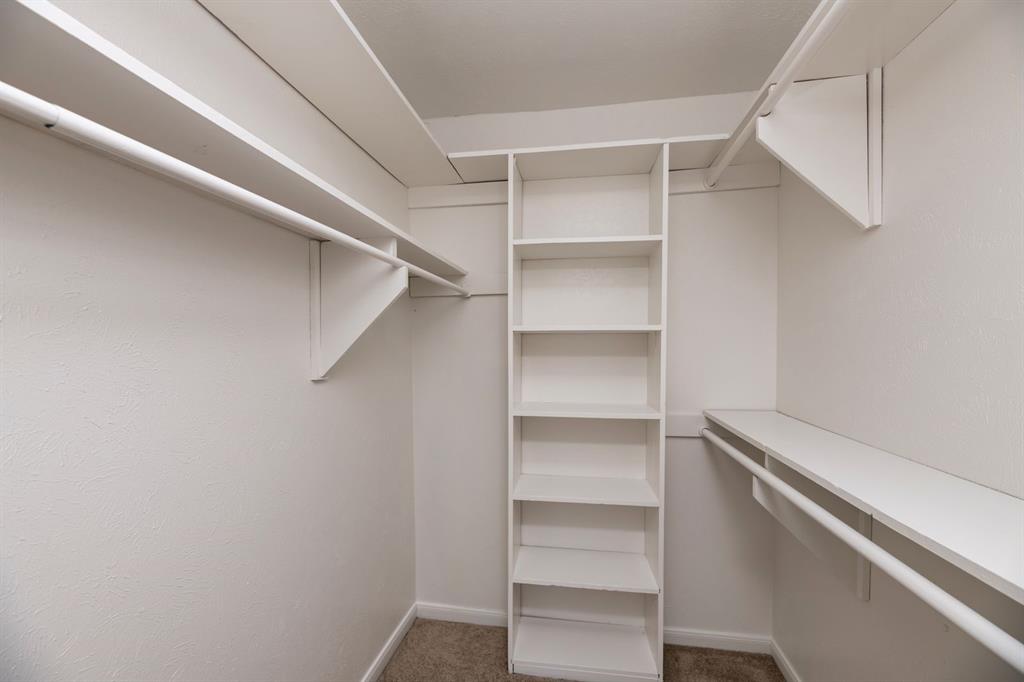 540 Billie Ruth Lane Hurst, TX 76053 - Photo 15 of 40 Spacious closet with light colored carpet
