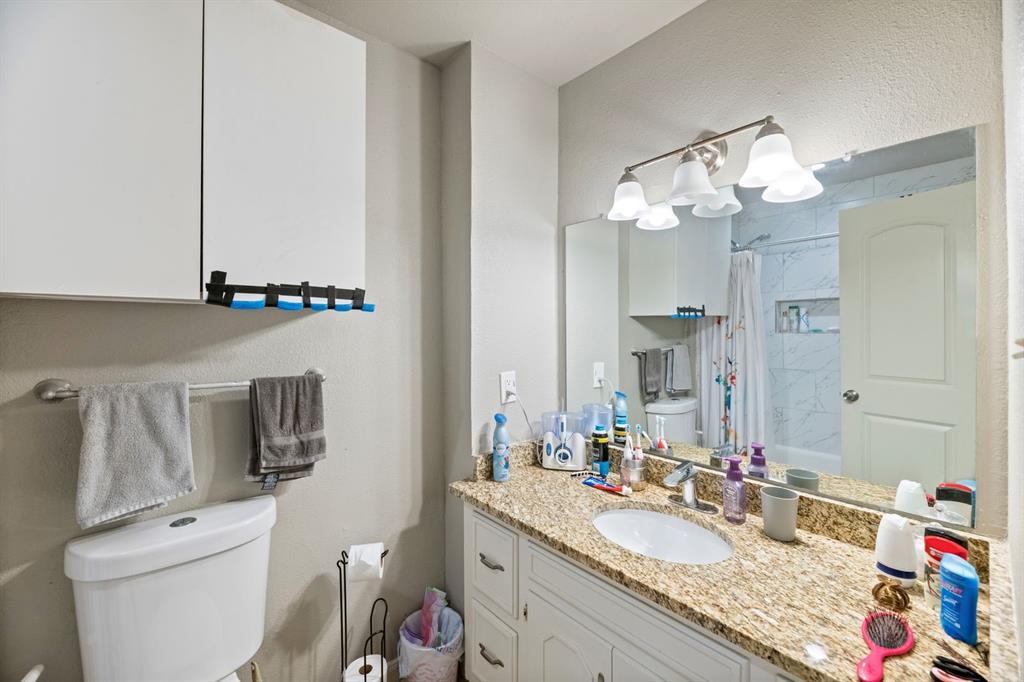 540 Billie Ruth Lane Hurst, TX 76053 - Photo 38 of 40 Full bath with vanity and shower / bath combo with shower curtain