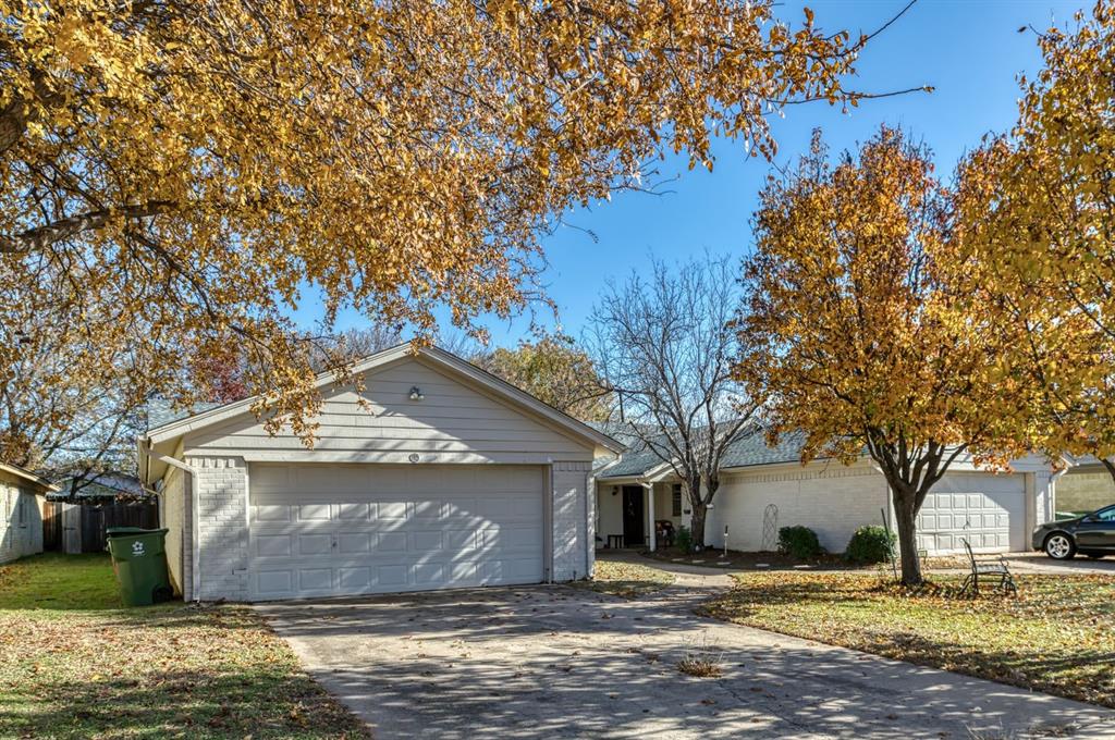 540 Billie Ruth Lane Hurst, TX 76053 - Photo 4 of 40 Single story home with brick siding, a garage, and concrete driveway