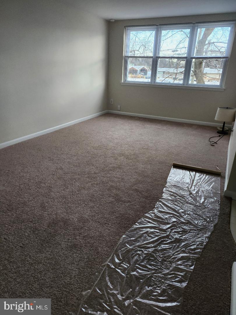 524 South Cedar Lane Upper Darby, PA 19082 - Photo 2 of 16 a view of wooden floor in a bedroom next to a window