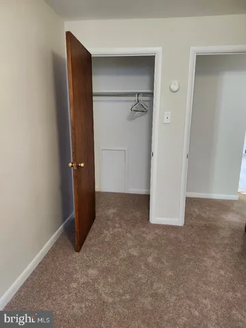 an empty room with closet