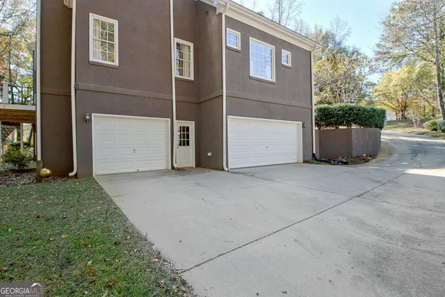 a view of living room kitchen with furniture and wooden floor