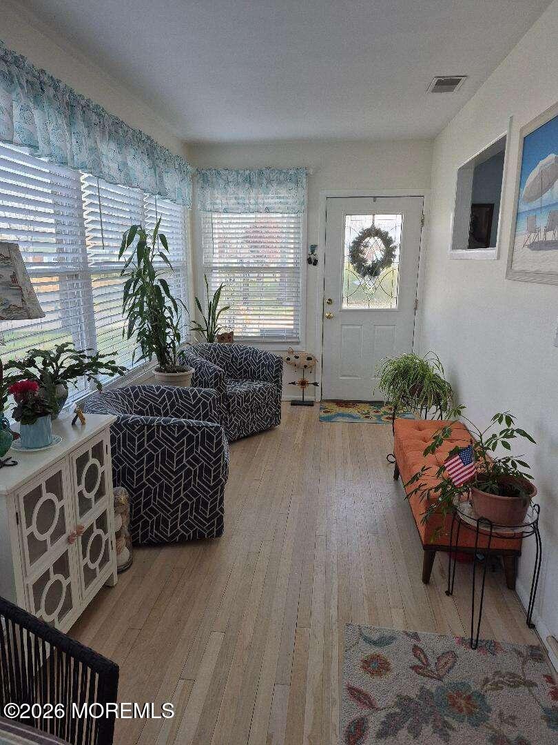 27 B Cedar Street Toms River, NJ 08757 - Photo 12 of 14 a living room with furniture and wooden floor
