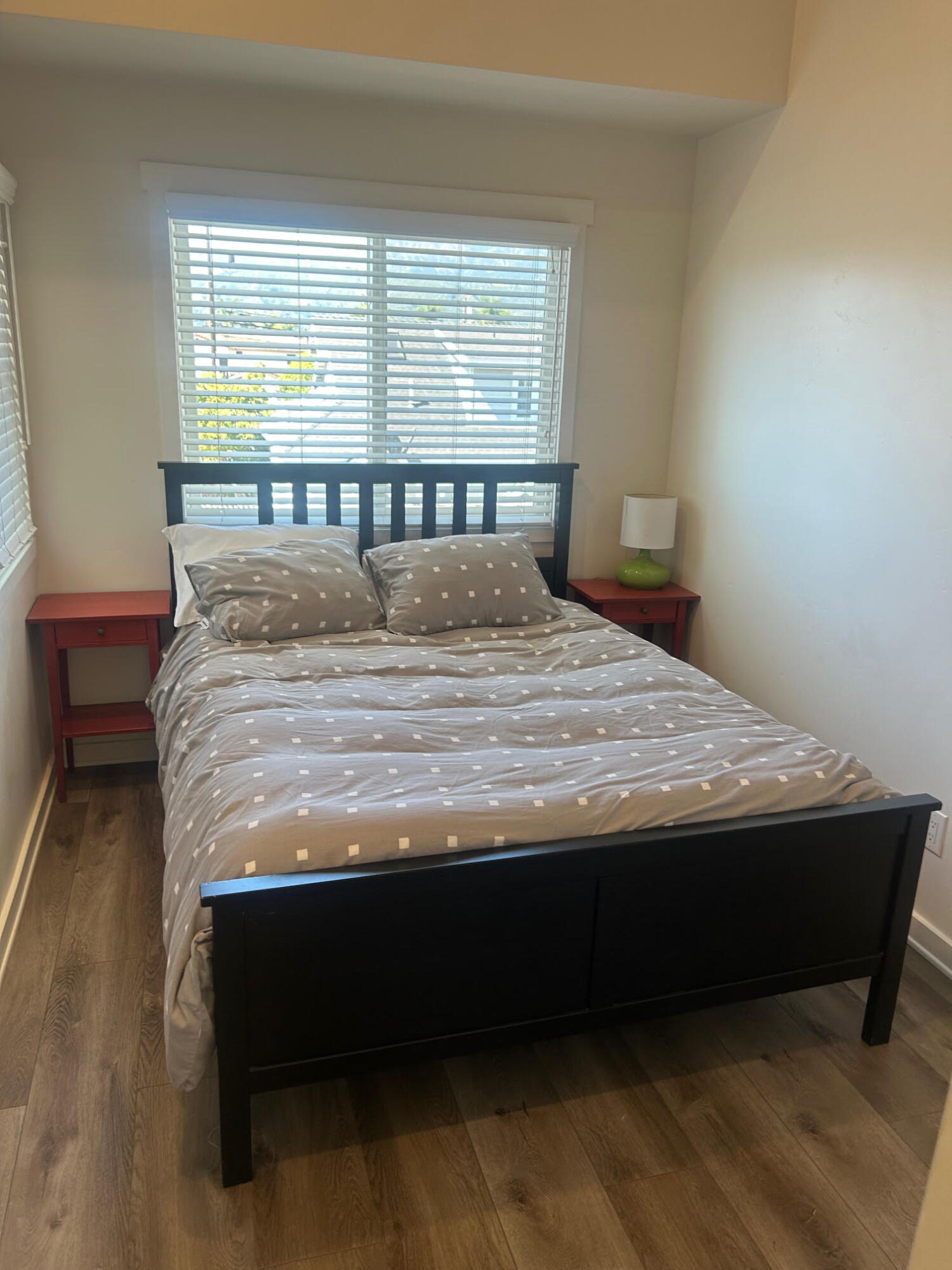 4858 5th Street Carpinteria, CA 93013 - Photo 7 of 10 a bed sitting in a bedroom next to a window