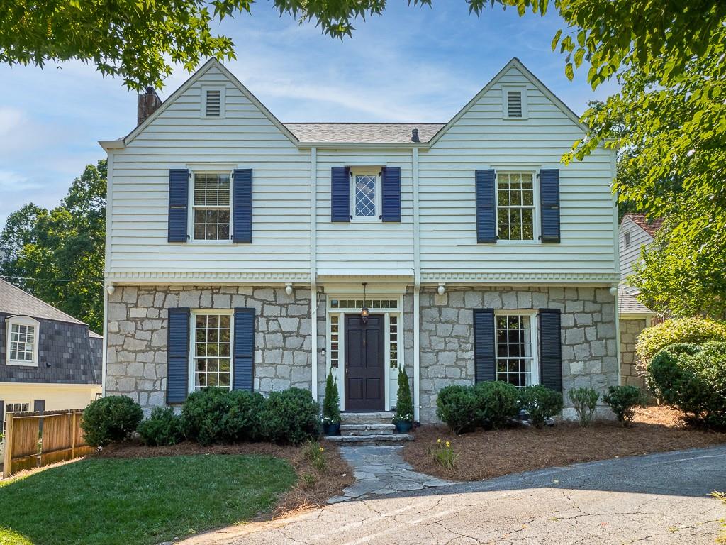 3620 Kingsboro Road Northeast Atlanta, GA 30319 - Photo 1 of 1 a front view of a house with garden