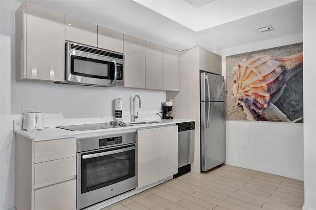 a kitchen with a table and a stove