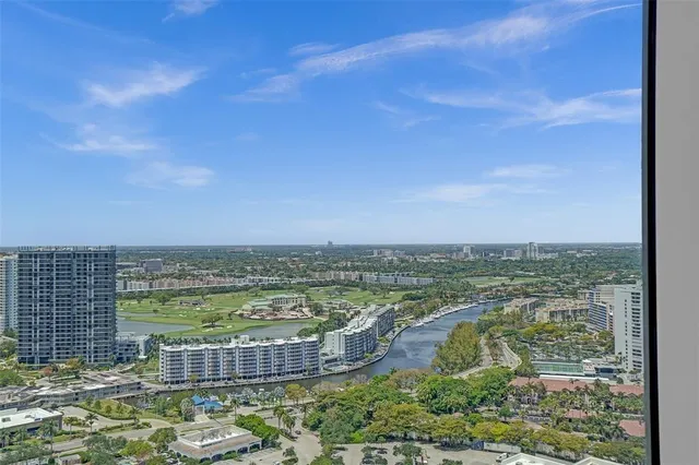 a view of a city with tall buildings