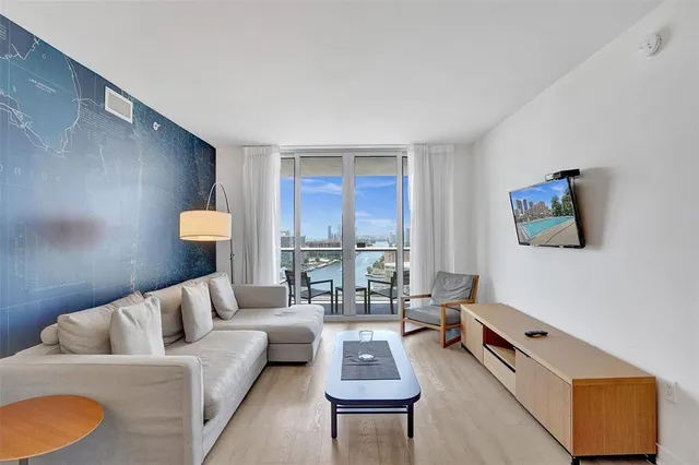 a front view of a house with sitting area