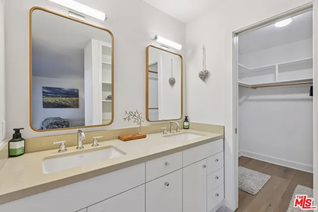 a bathroom with a tub and sink