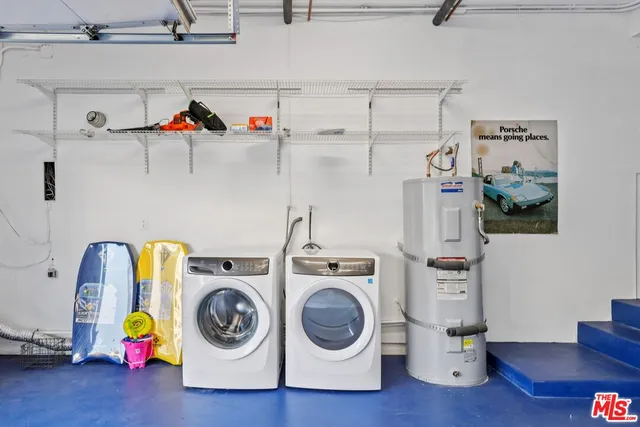 a view of a livingroom with furniture and a window
