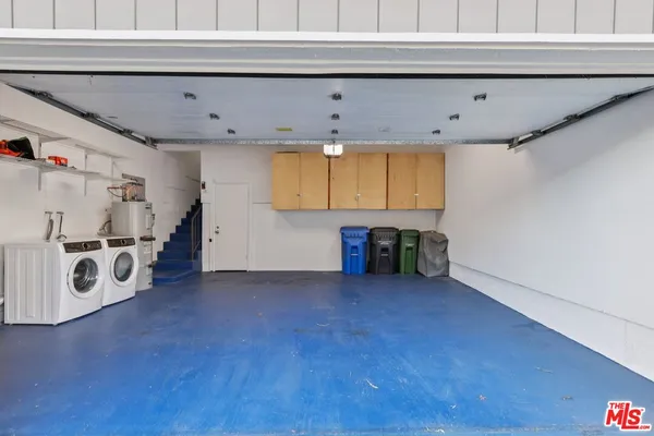 a view of balcony with furniture