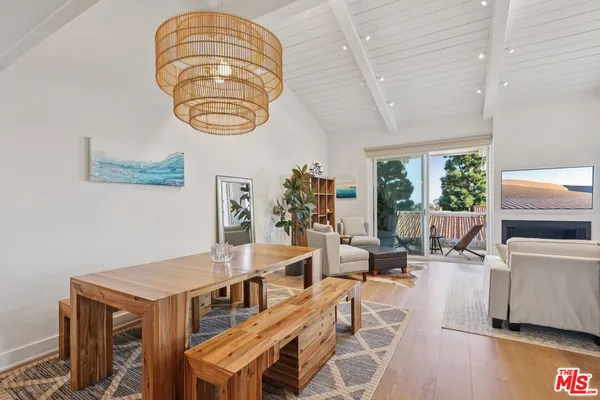 a kitchen with stainless steel appliances granite countertop a sink and a stove