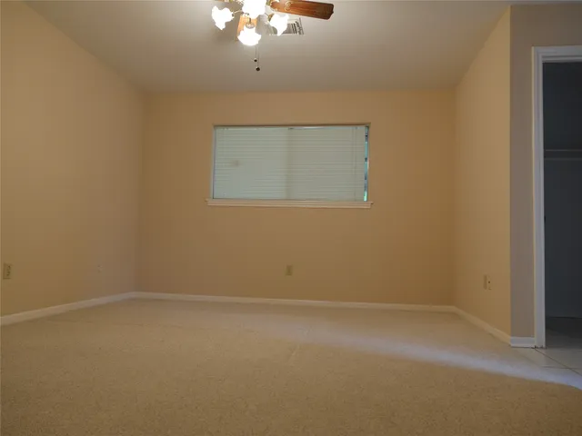 en empty room with a window