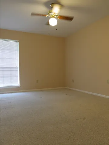 a view of a backyard with wooden floor