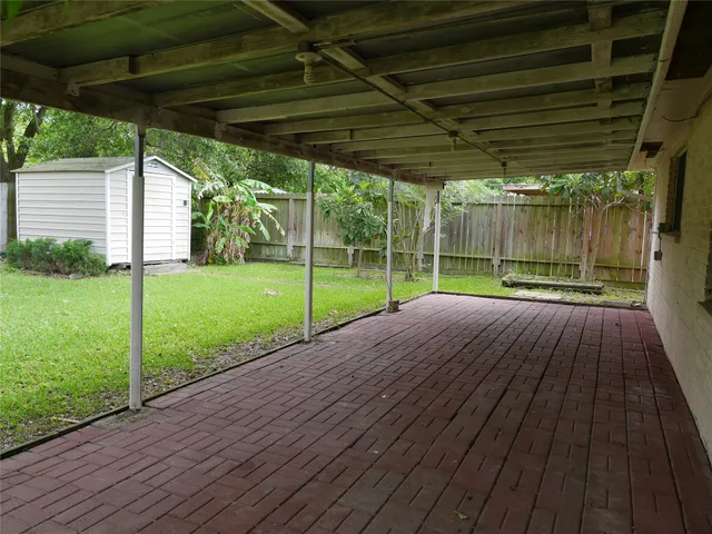 a backyard of a house with seating space