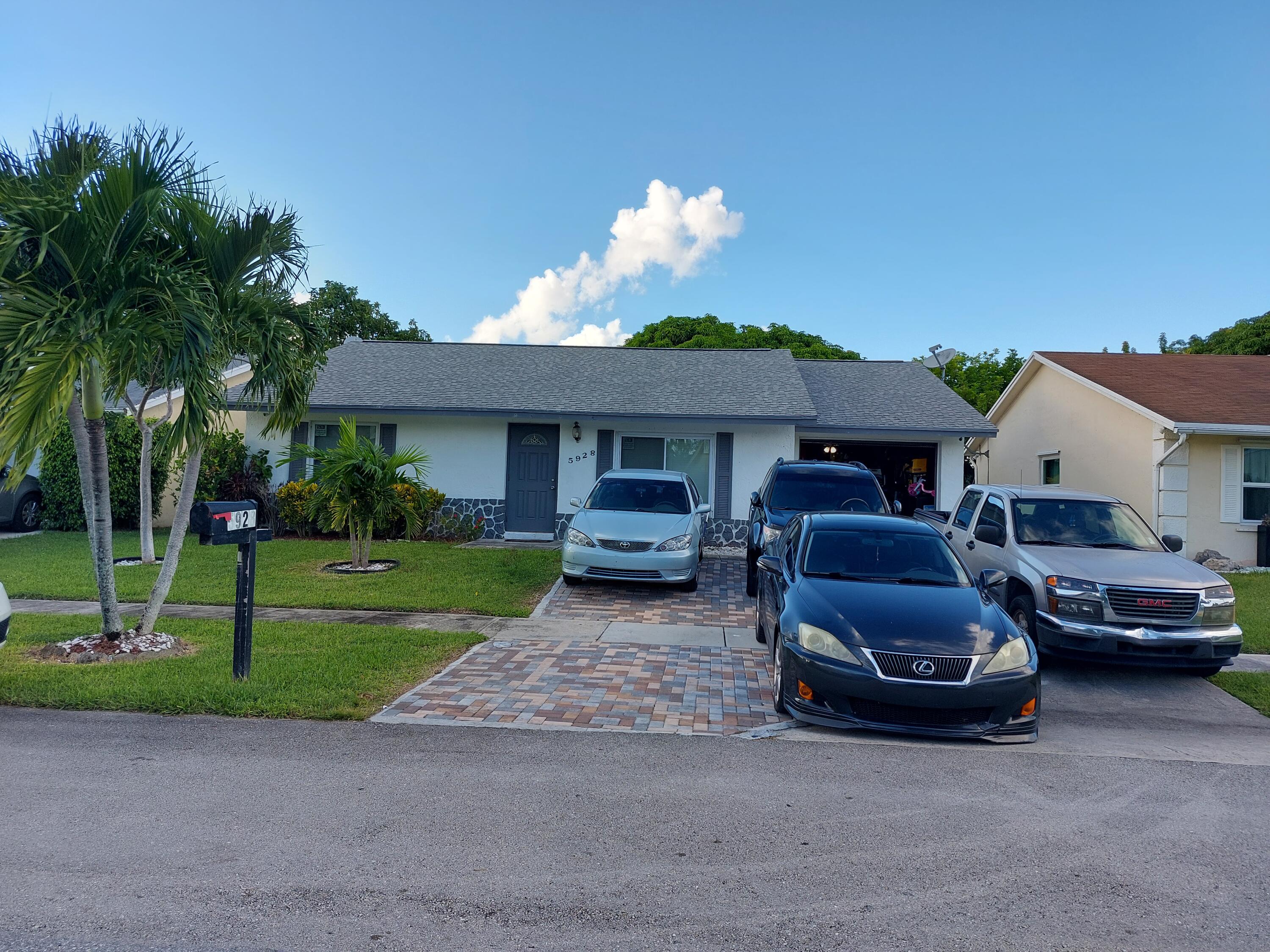 5928 Westfall Road Lake Worth, FL 33463 - Photo 1 of 14 Front View